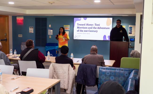 Jaimee Martin and Qamar Wilson discuss "Toward Home" by Toni Morrison with event attendees.