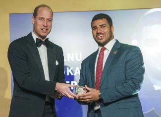 Britain’s Prince William presents an award to Gobhanu Sasankar Korisepati, a first-year student at the University of Pennsylvania from Oman, during the Diana Legacy Award, at the Science Museum in London, on March 14, 2024. (Image: Arthur Edwards/Pool Photo via AP)