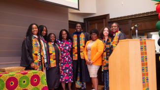 2025 Africana Studies Graduates posing with Dr. Marcia Chatelain and Carol Davis.